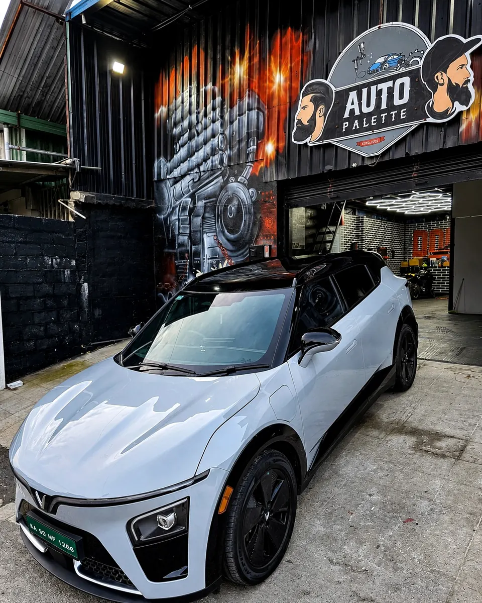 White crossover outside the Auto Palette studio