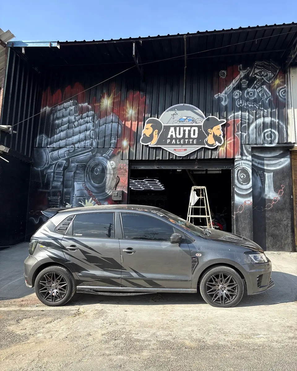 Grey hatchback parked in front of the Auto Palette studio in JP Nagar