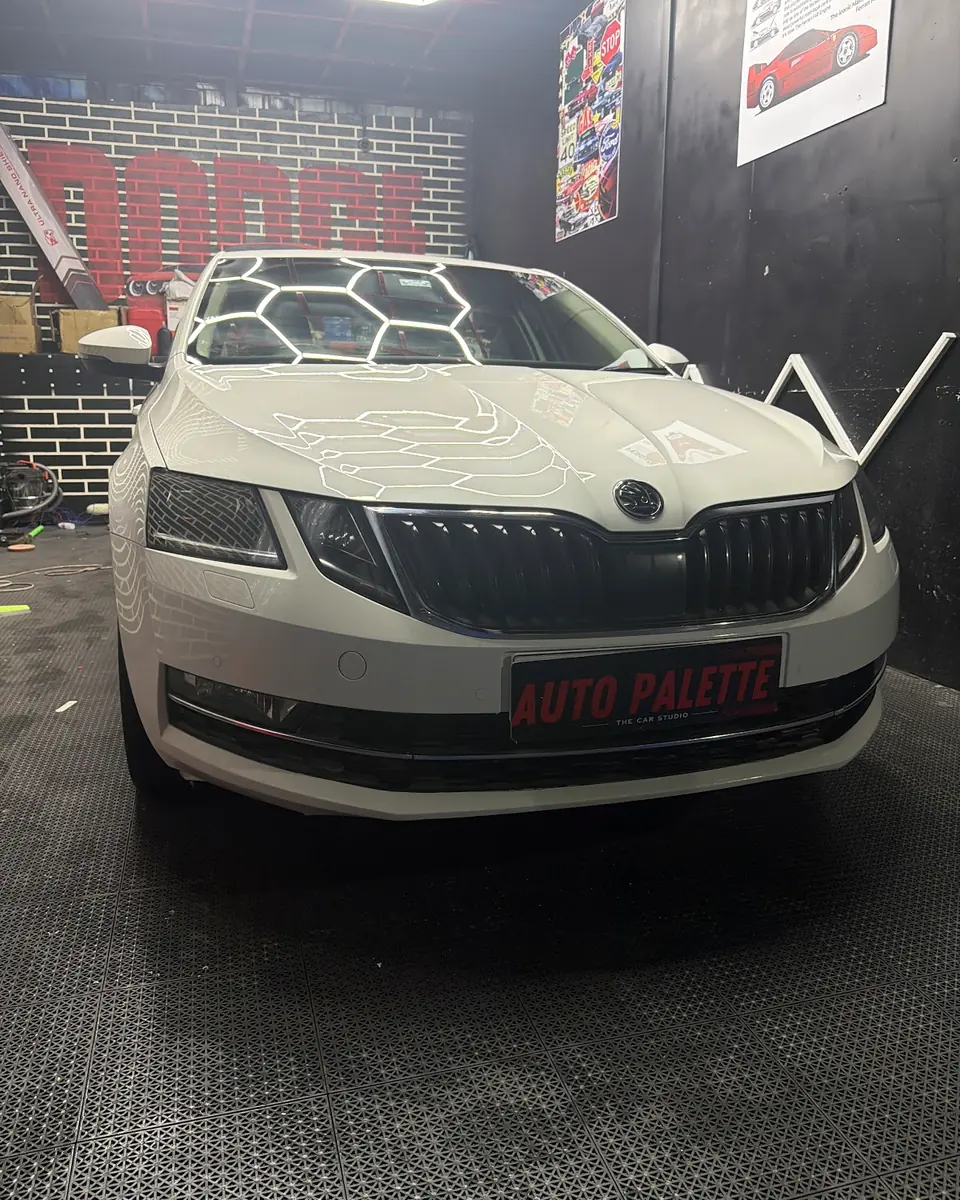 White Skoda in the detailing bay
