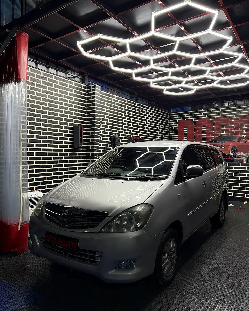 Silver MPV in the detailing bay